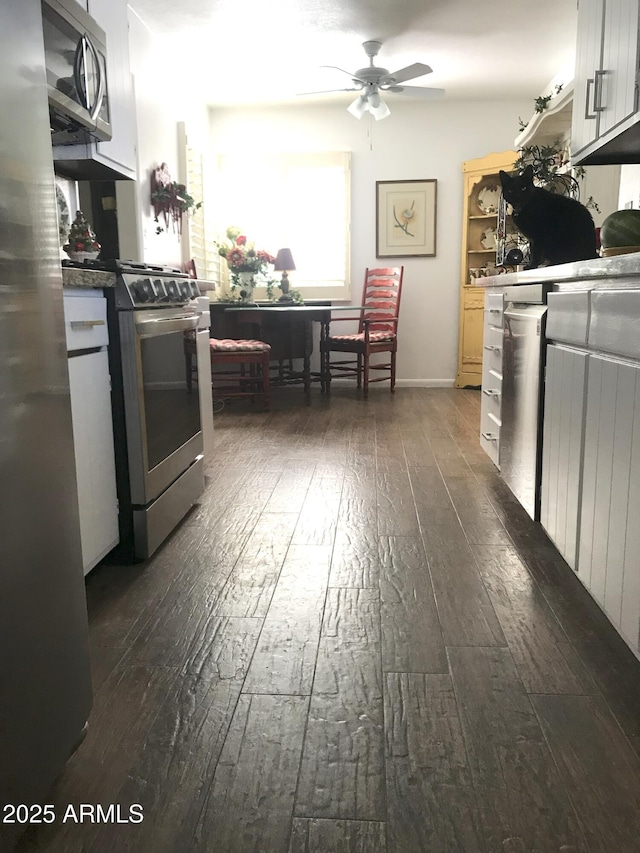 100 N Lazy Fox Rd Unit 8, Wickenburg, AZ 85390 - kitchen featuring appliances with stainless steel finishes, dark wood-style floors, and ceiling fan