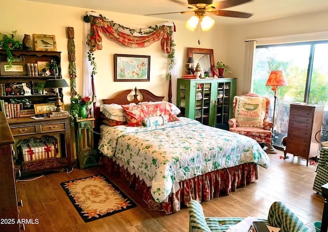 100 N Lazy Fox Rd Unit 8, Wickenburg, AZ 85390 - bedroom featuring hardwood / wood-style floors and ceiling fan