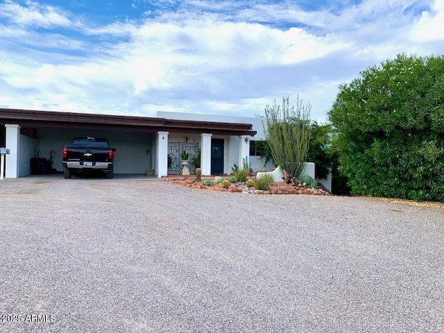 100 N Lazy Fox Rd Unit 8, Wickenburg, AZ 85390 - view of front of property with driveway and a carport