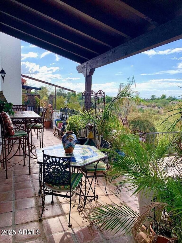 100 N Lazy Fox Rd Unit 8, Wickenburg, AZ 85390 - balcony with outdoor dining area