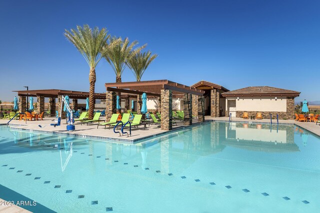 25097 N 174th Ln, Surprise, AZ 85387 - pool featuring a patio area and a pergola