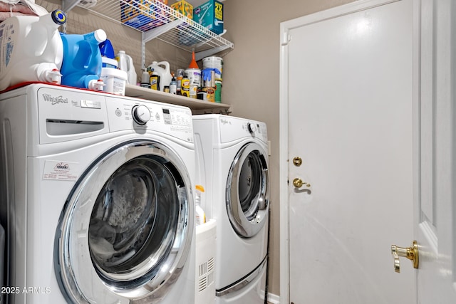 washroom with washer and dryer