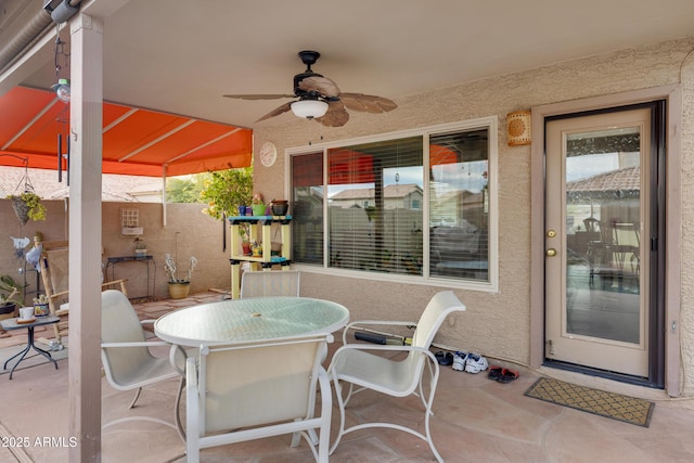 view of patio / terrace featuring ceiling fan