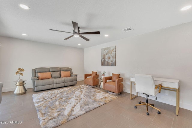 living room with ceiling fan