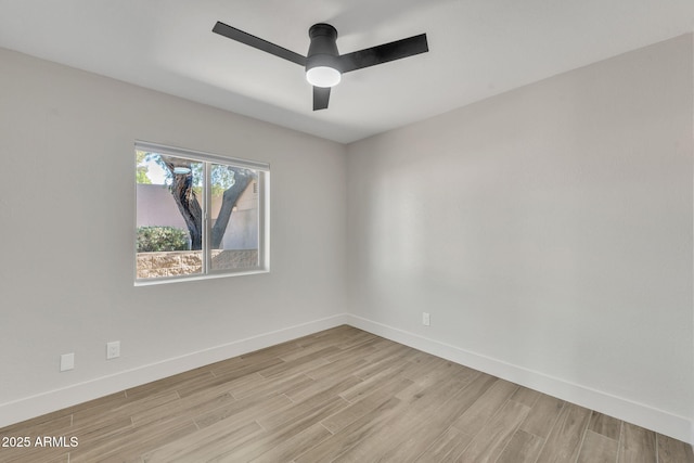 unfurnished room with ceiling fan and light hardwood / wood-style flooring