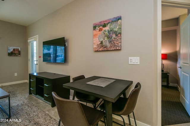 dining room with baseboards