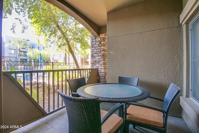 balcony with outdoor dining area