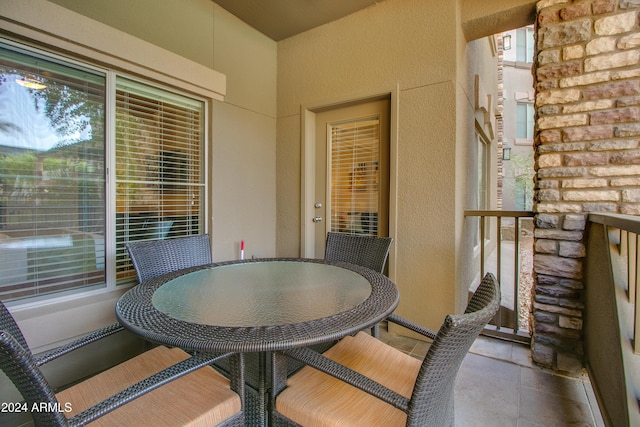 balcony with outdoor dining area