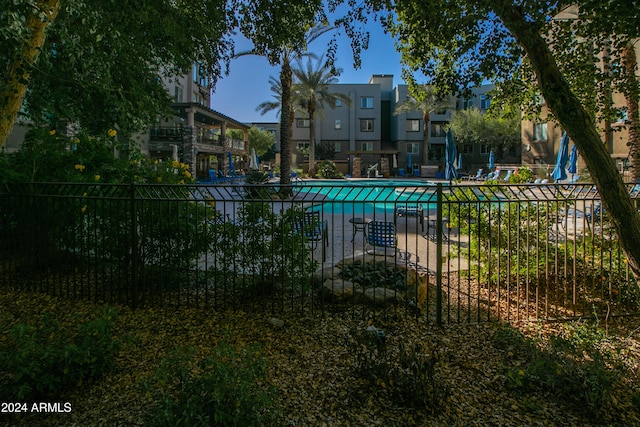 community pool with fence