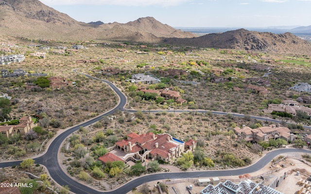 drone / aerial view featuring a mountain view