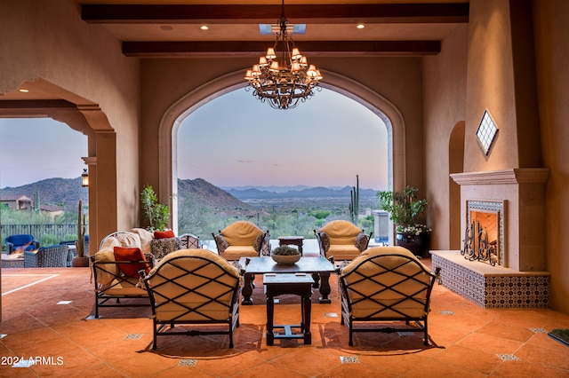 patio terrace at dusk with a mountain view