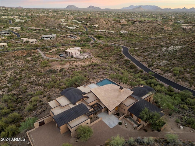 view of aerial view at dusk