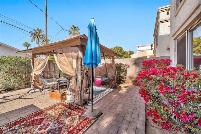 view of patio featuring a gazebo