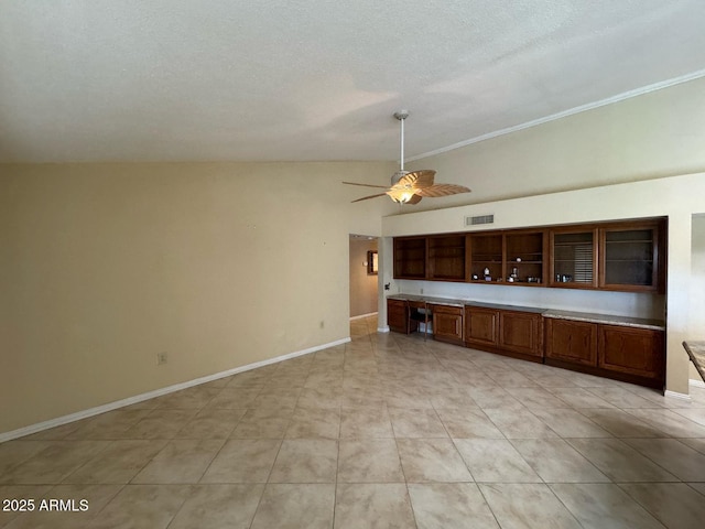 unfurnished living room with light tile patterned flooring, a textured ceiling, a ceiling fan, baseboards, and visible vents