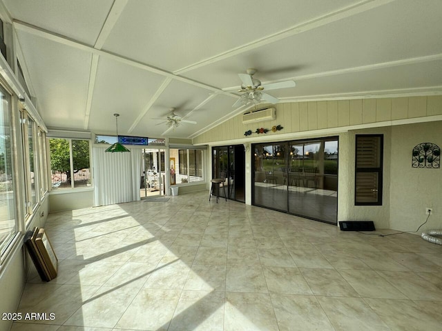 unfurnished sunroom with an AC wall unit and a ceiling fan