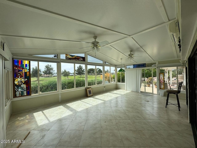 unfurnished sunroom with ceiling fan
