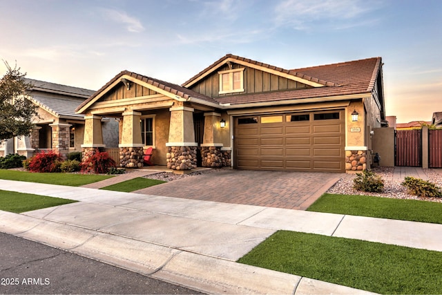 craftsman inspired home with a garage