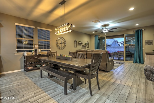 dining space with ceiling fan