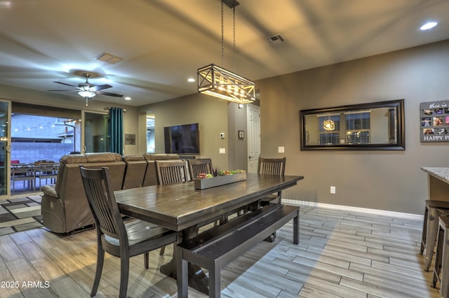 dining space featuring ceiling fan