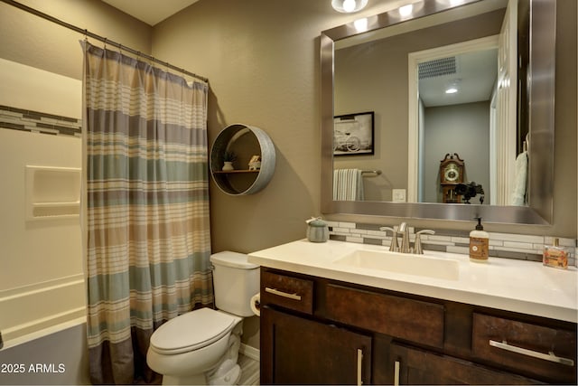 full bathroom with toilet, shower / tub combo, and vanity