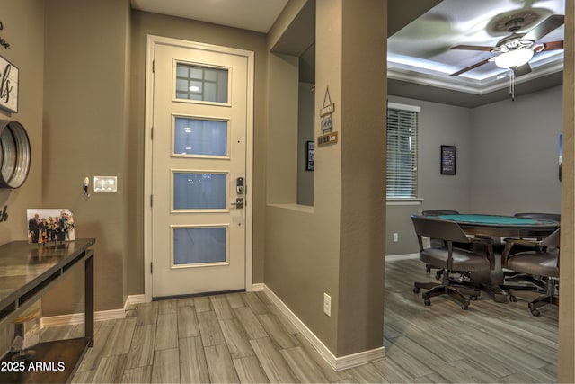 entrance foyer featuring ceiling fan and light hardwood / wood-style flooring