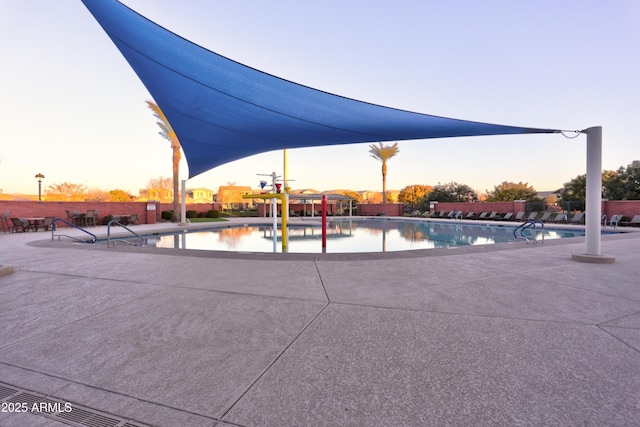 view of home's community featuring a patio