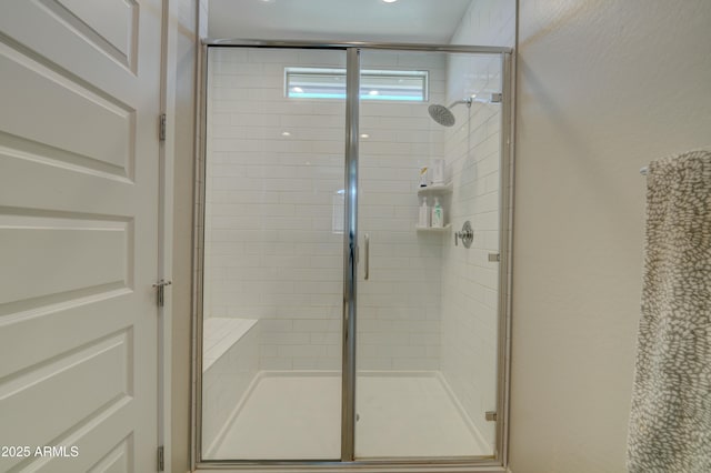 bathroom featuring a stall shower