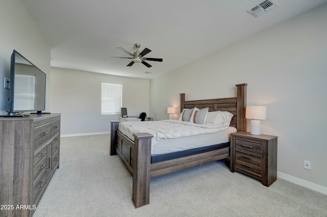 bedroom featuring visible vents, baseboards, a ceiling fan, and light colored carpet