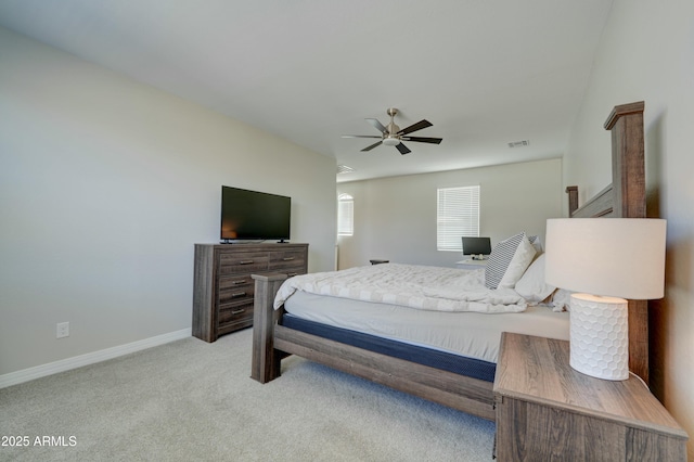 bedroom with ceiling fan, visible vents, baseboards, and carpet floors