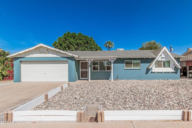 single story home featuring driveway and a garage
