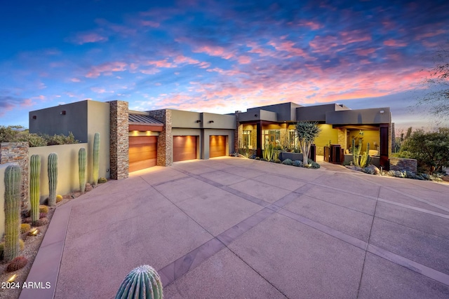 view of front of property with a garage