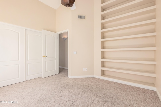 unfurnished bedroom with carpet floors