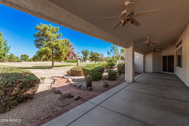 view of patio featuring ceiling fan