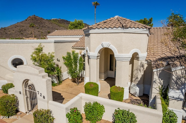 view of side of property featuring a mountain view