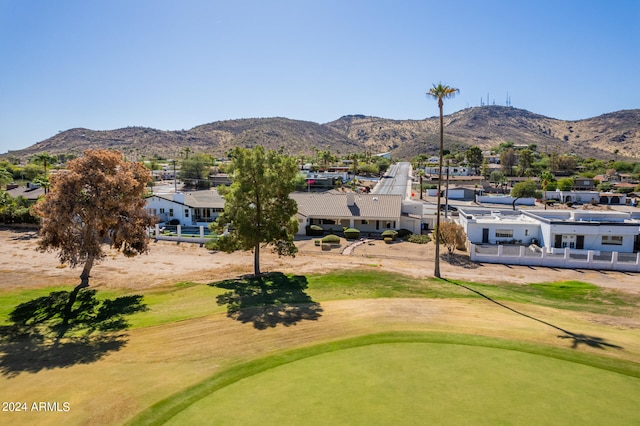 birds eye view of property featuring a mountain view