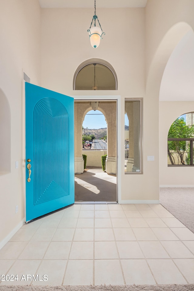 view of tiled foyer entrance