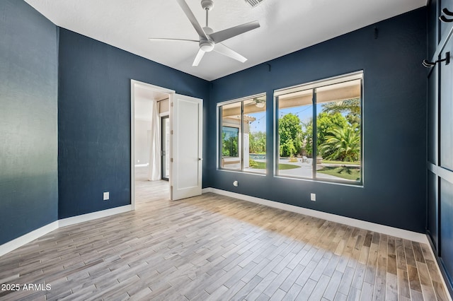 422 E Kaibab Pl, Chandler, AZ 85249 - empty room featuring wood finished floors and a ceiling fan