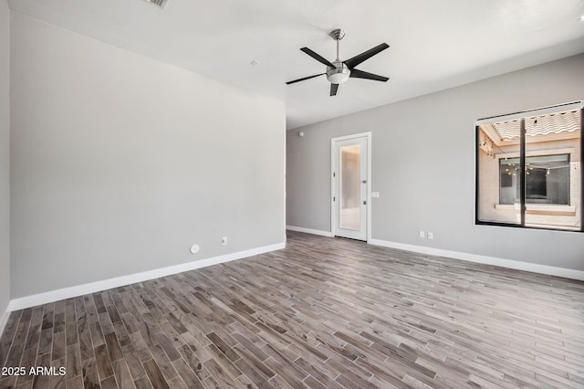 422 E Kaibab Pl, Chandler, AZ 85249 - spare room featuring wood finished floors and ceiling fan