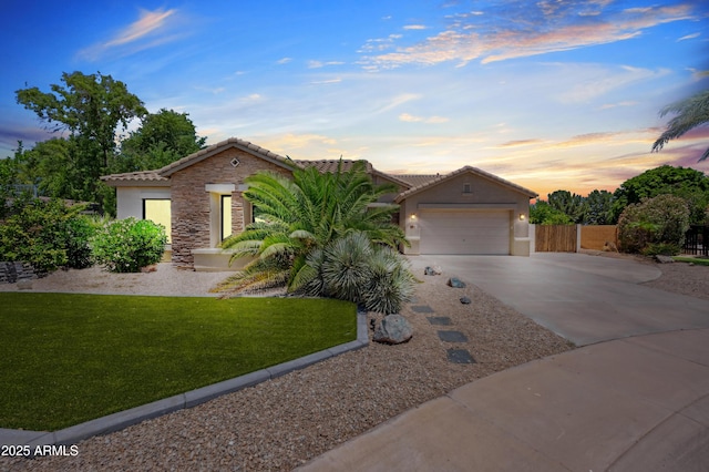 422 E Kaibab Pl, Chandler, AZ 85249 - view of front of home with concrete driveway, stucco siding, and a tile roof