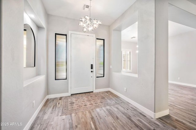 422 E Kaibab Pl, Chandler, AZ 85249 - entrance foyer featuring wood finished floors and a chandelier