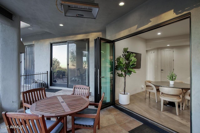 interior space featuring outdoor dining area