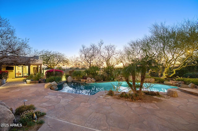 outdoor pool featuring a patio area