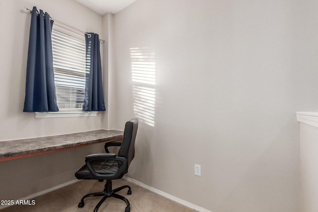 office featuring carpet flooring and built in desk