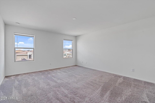 618 E Elm Ln, Avondale, AZ 85323 - carpeted empty room featuring baseboards