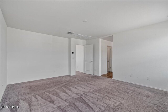 618 E Elm Ln, Avondale, AZ 85323 - empty room with carpet and visible vents