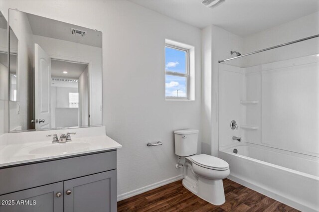 618 E Elm Ln, Avondale, AZ 85323 - full bath with toilet, visible vents, wood finished floors, and vanity