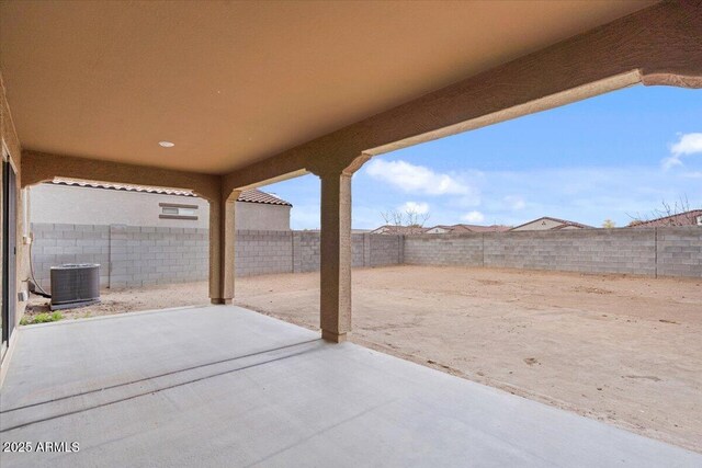 618 E Elm Ln, Avondale, AZ 85323 - view of patio featuring central AC and a fenced backyard