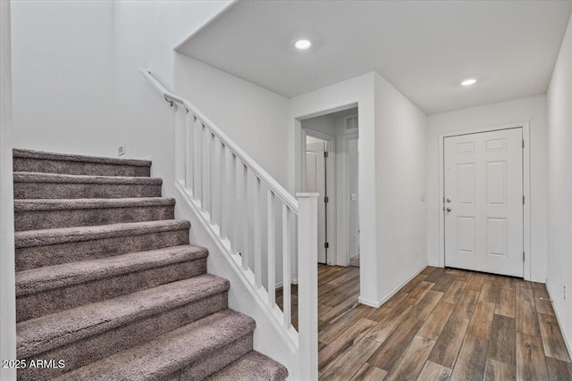 618 E Elm Ln, Avondale, AZ 85323 - foyer entrance featuring visible vents, stairway, wood finished floors, and recessed lighting