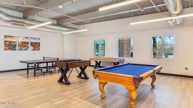 rec room featuring billiards, baseboards, and wood finished floors