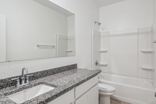 full bath featuring tub / shower combination, toilet, and vanity